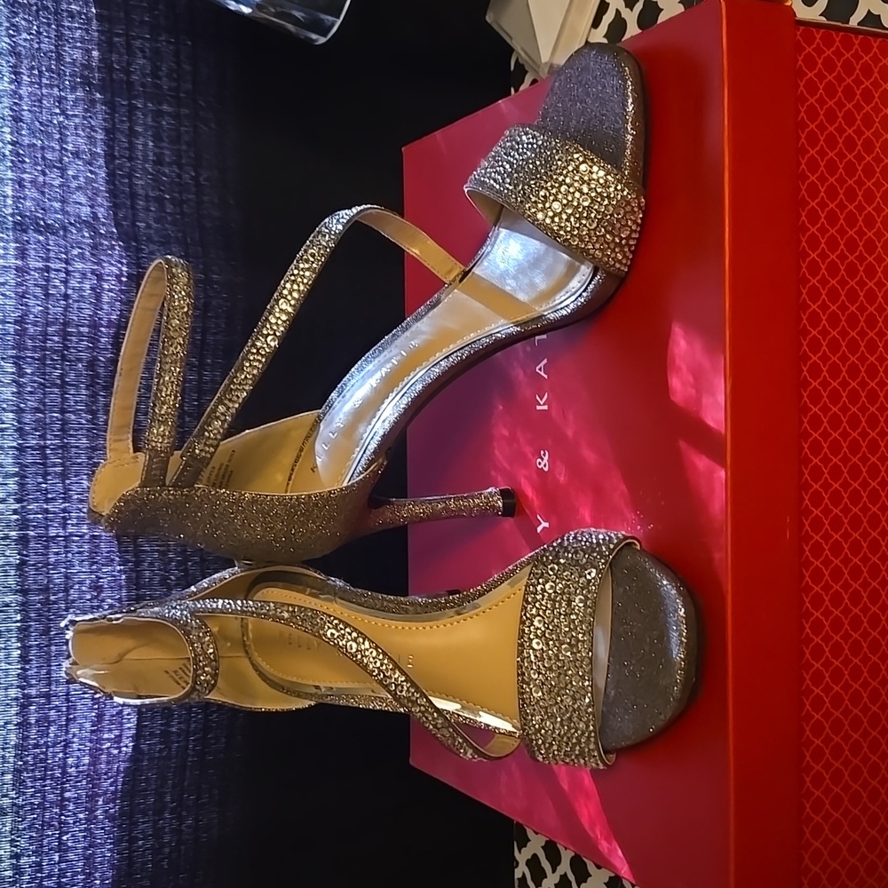 Silver heels worn once